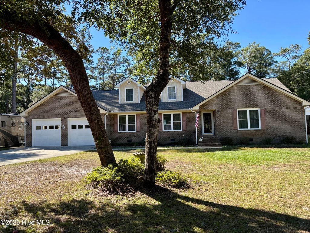 Photo of 6 Deerwood Circle, Oak Island, NC 28465 (MLS # 100539788)
