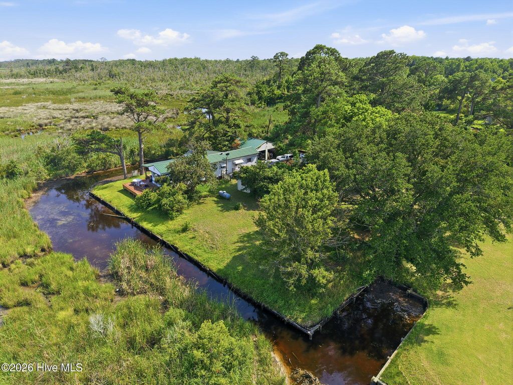 Photo of 132 Poplar Bay Road, Poplar Branch, NC 27965 (MLS # 100586498)