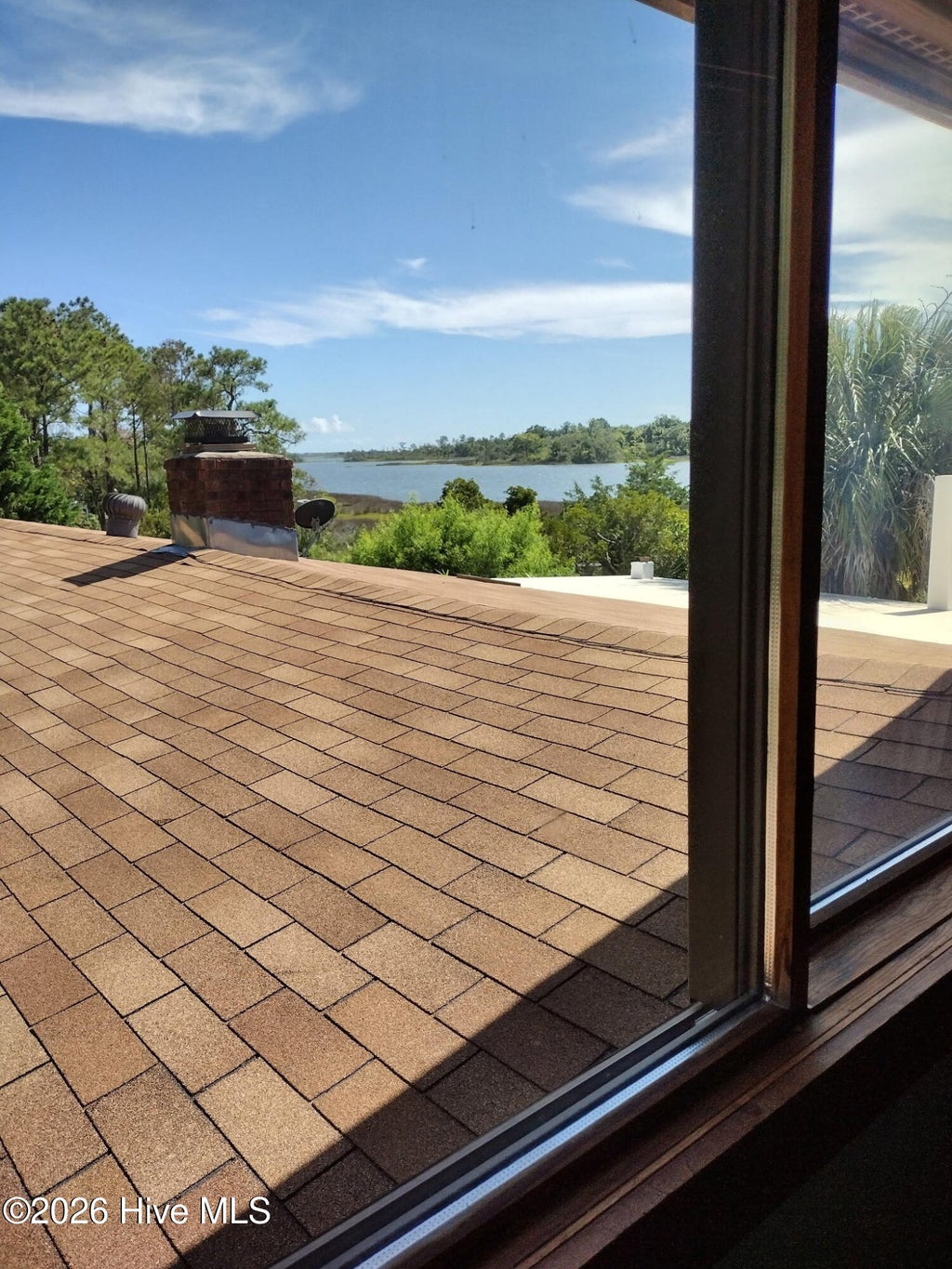 Photo of 737 Cockle Street, Surf City, NC 28445 (MLS # 100593009)