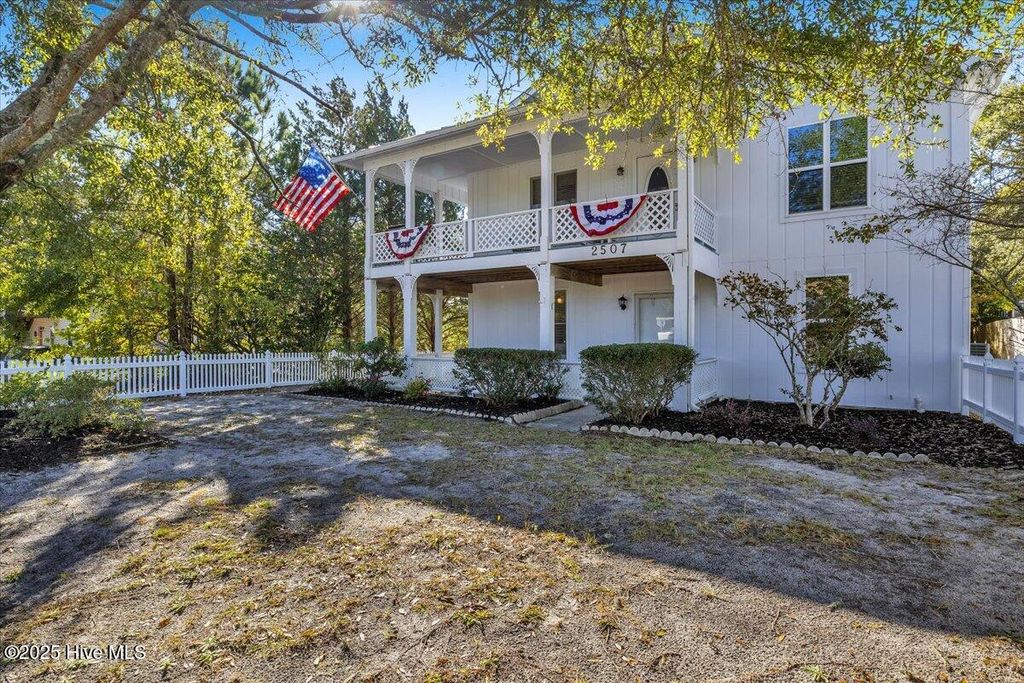 Photo of 2507 E Oak Island Drive, Oak Island, NC 28465 (MLS # 100539108)