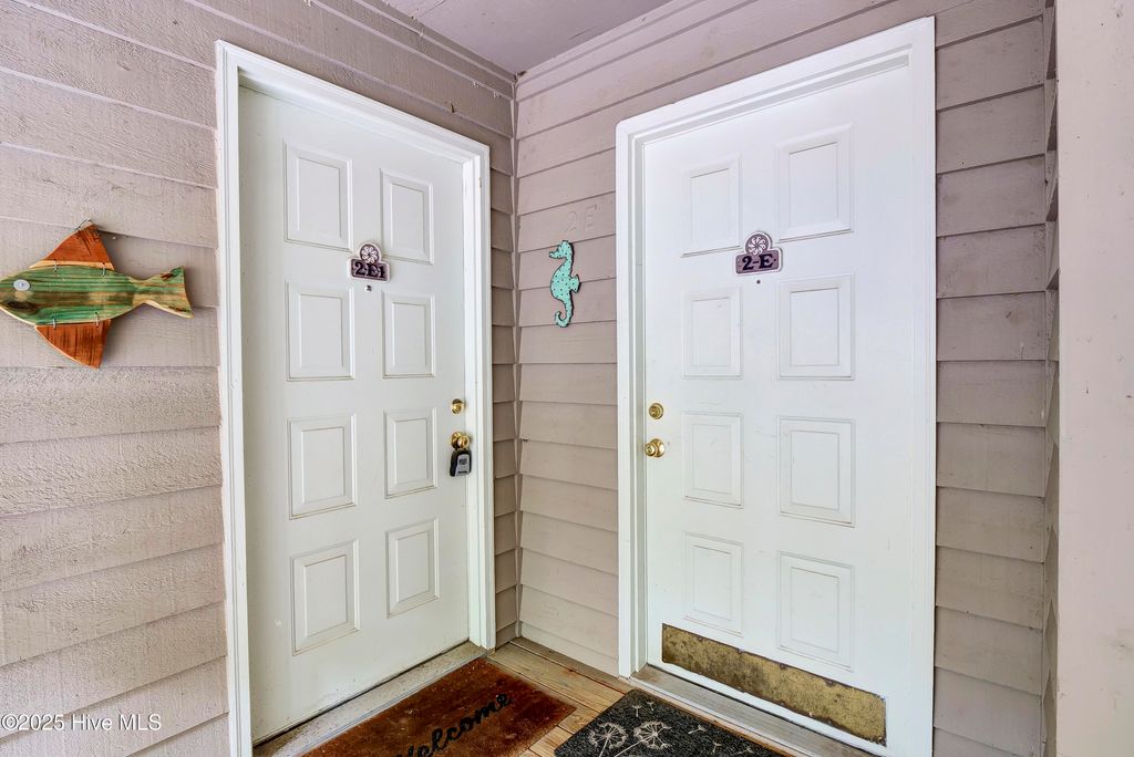 Photo of 802 Colony Place #2e, Sunset Beach, NC 28468 (MLS # 100508575)