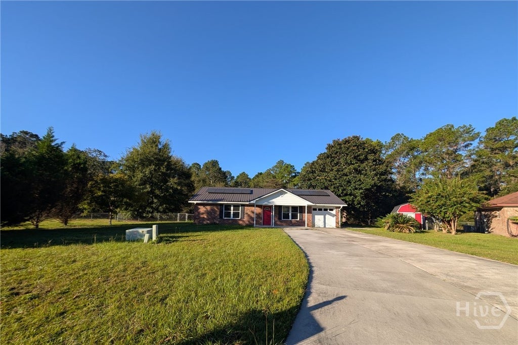 Photo of 1466 Paul Caswell Boulevard, Hinesville, GA 31313 (MLS # SA366912)
