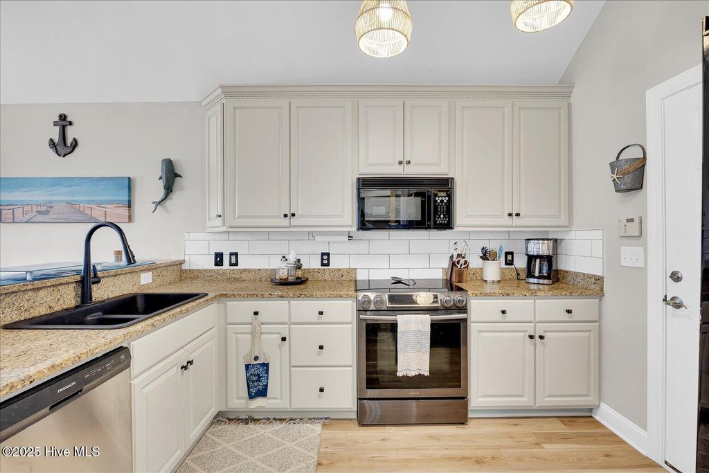 Photo of 115 Castle Bay Drive, Hampstead, NC 28443 (MLS # 100500169)