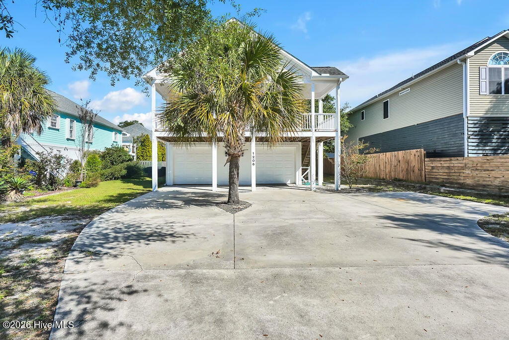 Photo of 1206 E Oak Island Drive, Oak Island, NC 28465 (MLS # 100608709)