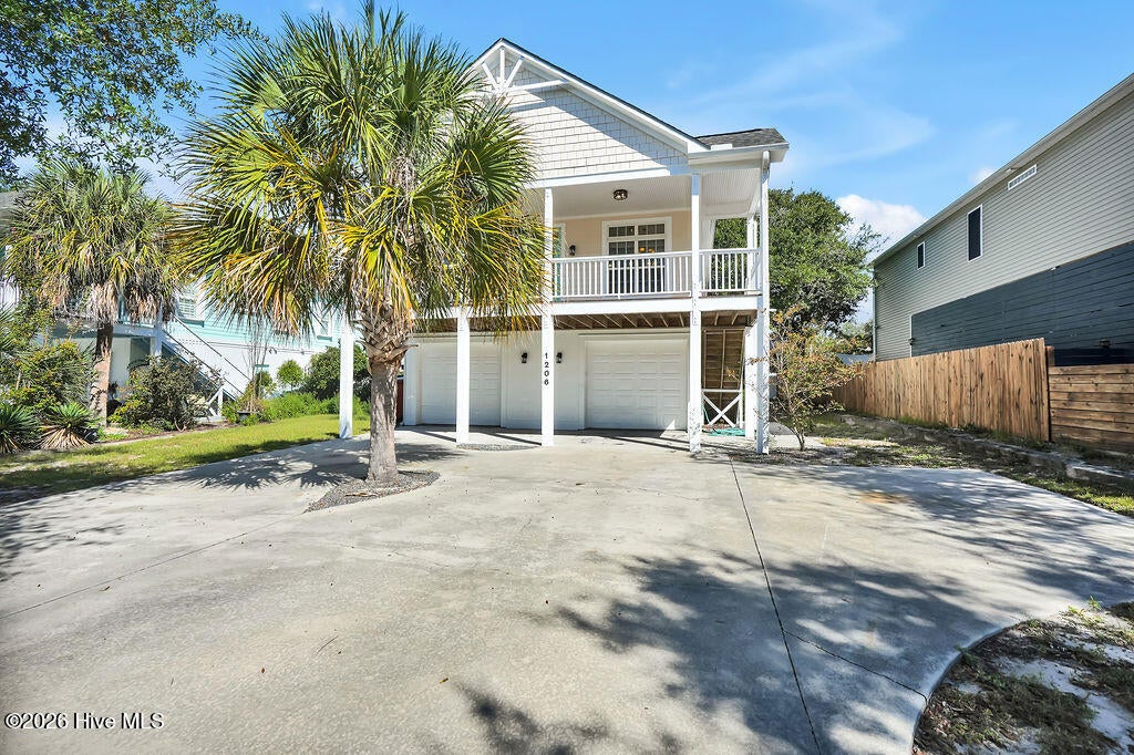 Photo of 1206 E Oak Island Drive, Oak Island, NC 28465 (MLS # 100608709)