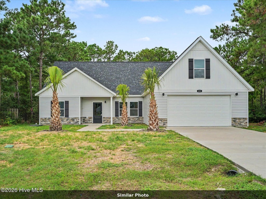 Photo of 504 Saratoga Road, Sneads Ferry, NC 28460 (MLS # 100571193)