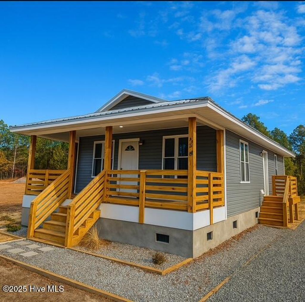 Photo of 431 Morris Landing Road, Holly Ridge, NC 28445 (MLS # 100533322)