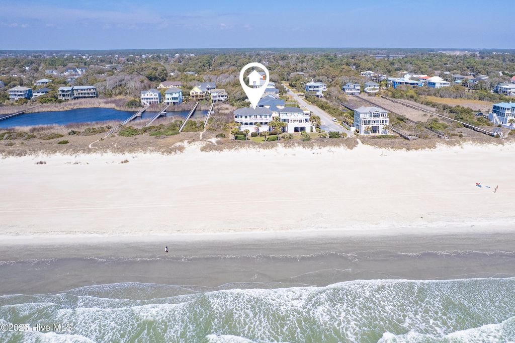 Photo of 121 SE 67th Street, Oak Island, NC 28465 (MLS # 100567897)