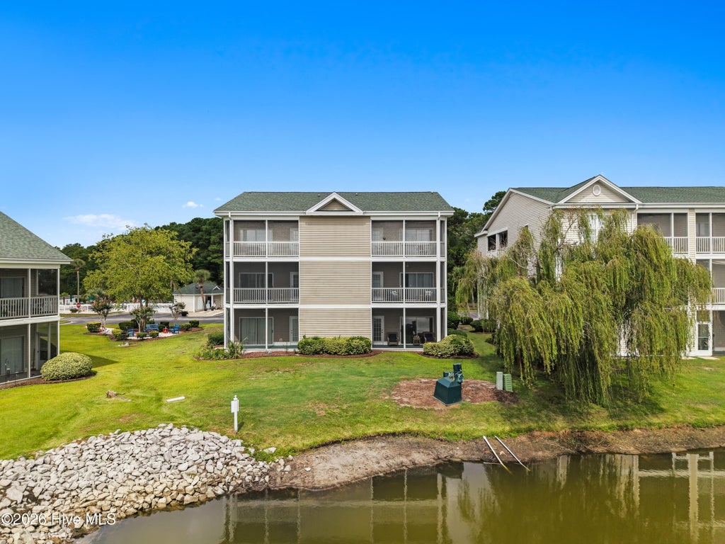 Photo of 7509 Moorhen Lane SW # 1, Sunset Beach, NC 28468 (MLS # 100600143)