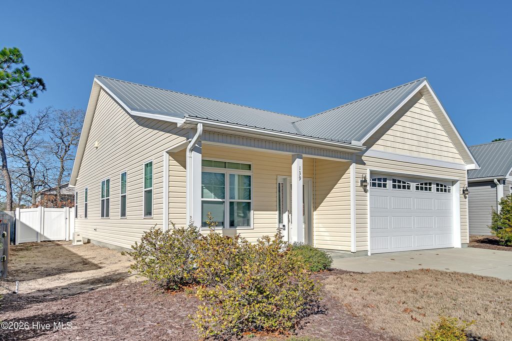 Photo of 139 NE 11th Street, Oak Island, NC 28465 (MLS # 100549984)