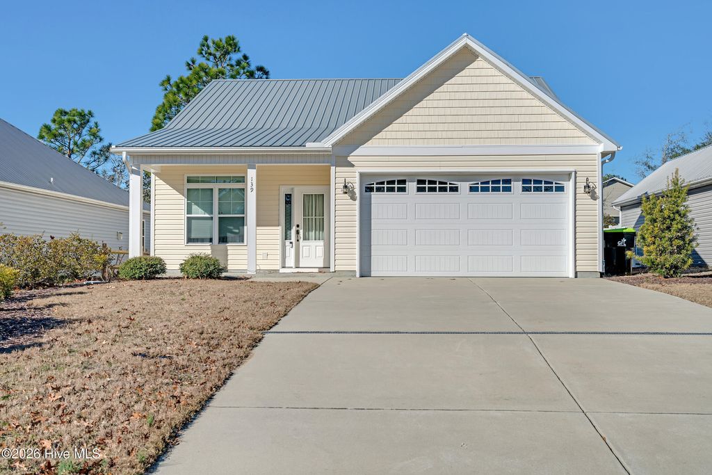 Photo of 139 NE 11th Street, Oak Island, NC 28465 (MLS # 100549984)