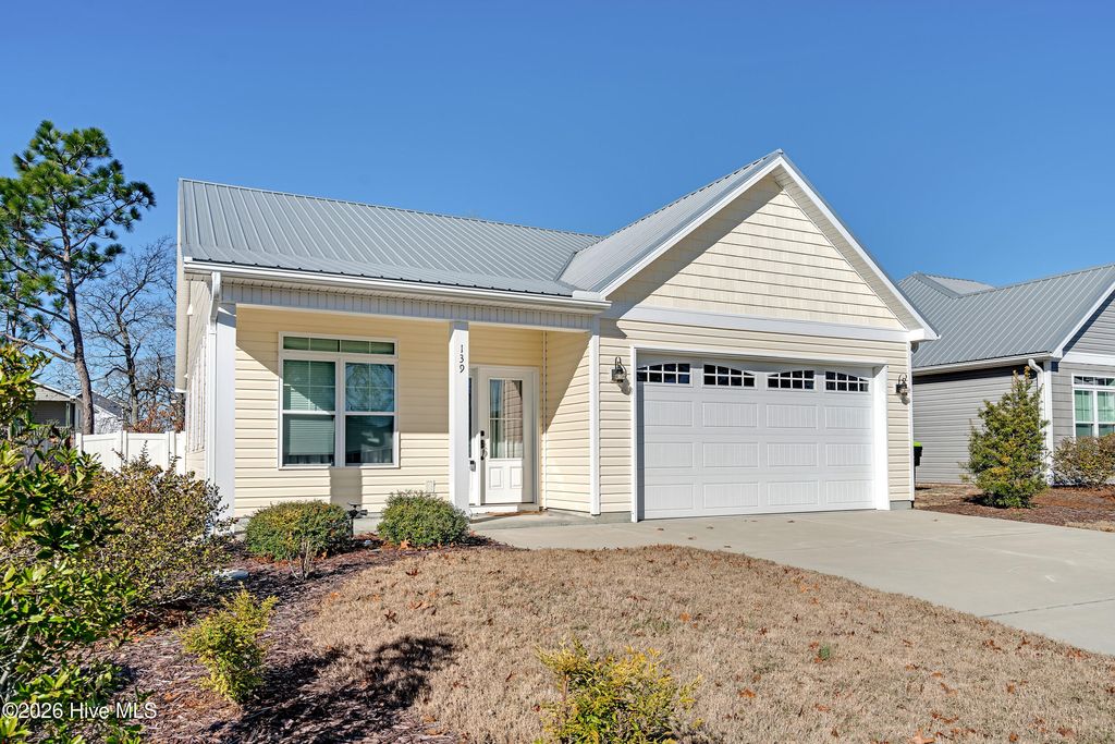 Photo of 139 NE 11th Street, Oak Island, NC 28465 (MLS # 100549984)