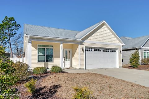 Photo of 139 NE 11th Street, Oak Island, NC 28465 (MLS # 100549984)