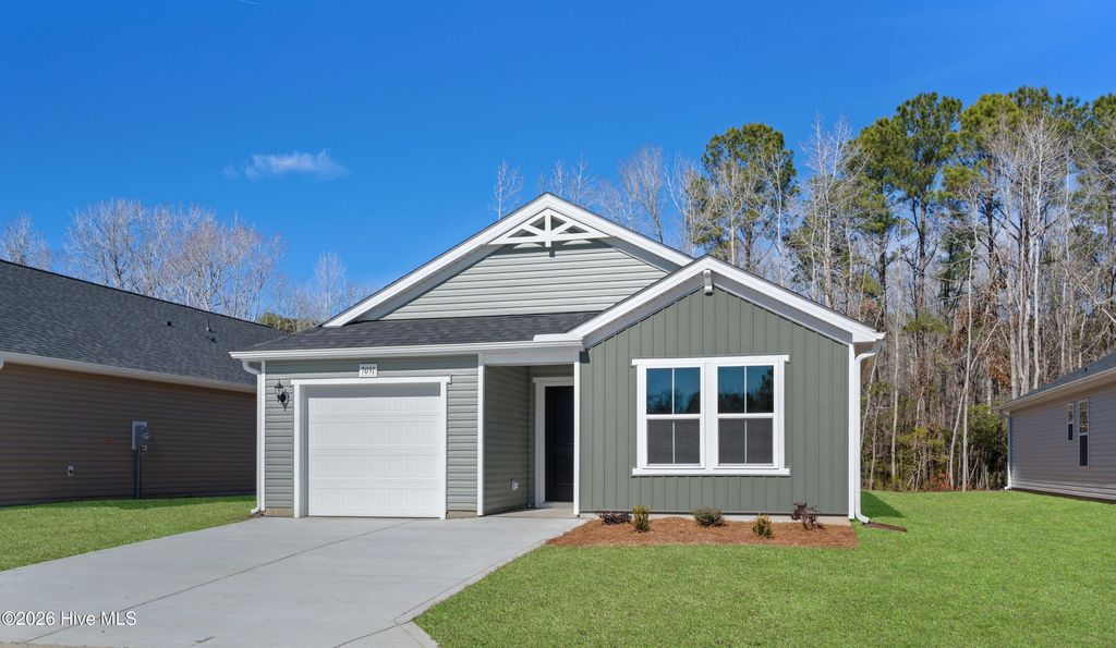 Photo of 7091 Woodline Drive SW, Sunset Beach, NC 28468 (MLS # 100552120)
