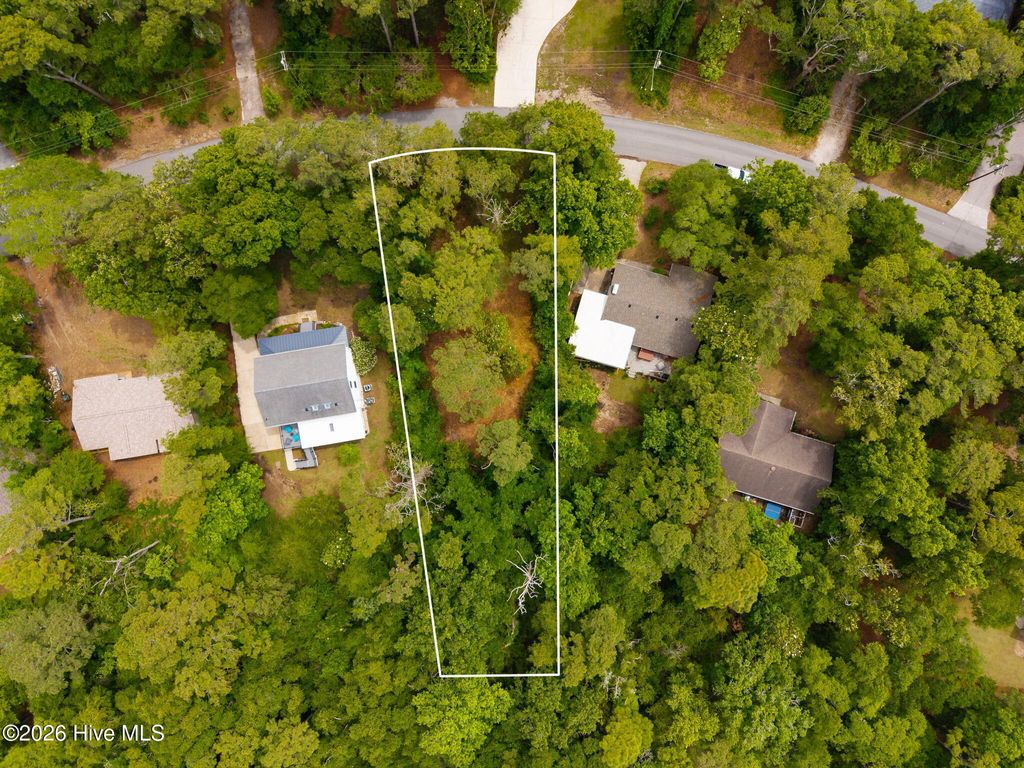 Photo of 116 Hawthorne Drive, Pine Knoll Shores, NC 28512 (MLS # 100573806)