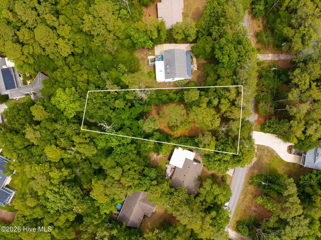 Photo of 116 Hawthorne Drive, Pine Knoll Shores, NC 28512 (MLS # 100573806)