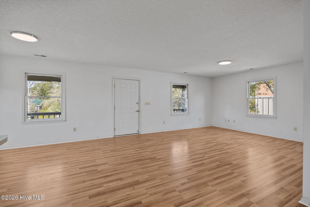 Photo of 228 NE 52nd Street, Oak Island, NC 28465 (MLS # 100558254)