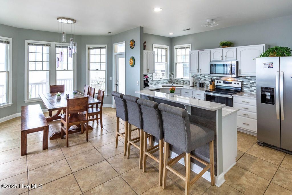 Photo of 73 Ballast Point Drive, Manteo, NC 27954 (MLS # 100537318)