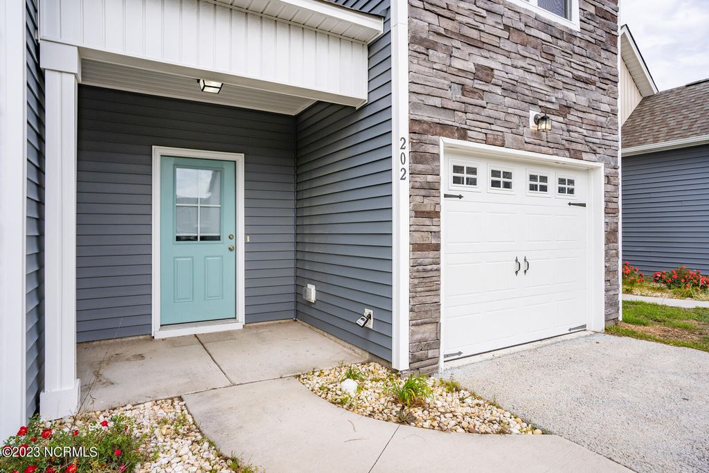 Photo of 202 N Stingray Lane, Sneads Ferry, NC 28460 (MLS # 100552237)