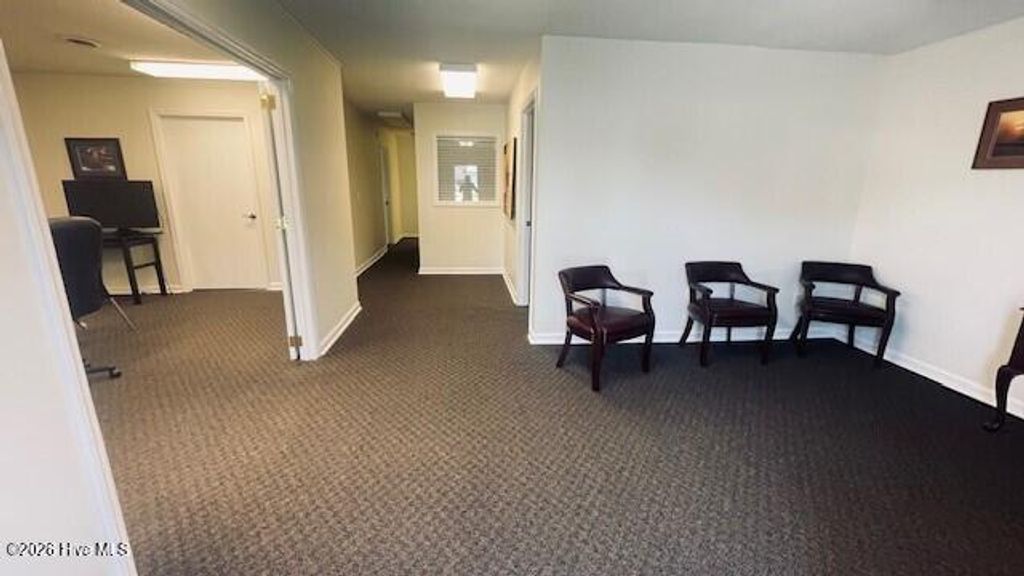 Photo of 8821 E Oak Island Drive #1, Oak Island, NC 28465 (MLS # 100557949)