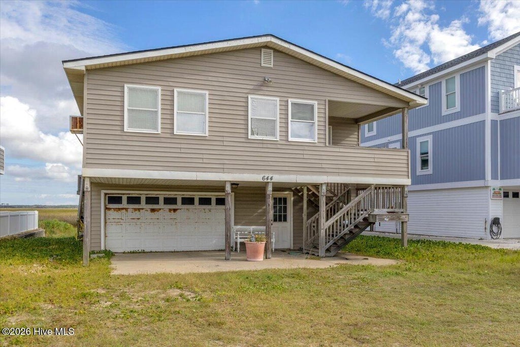 Photo of 644 Caswell Beach Road, Caswell Beach, NC 28465 (MLS # 100606853)