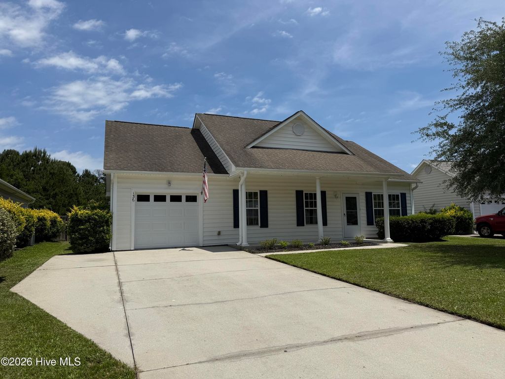 Photo of 136 N Palm Drive, Winnabow, NC 28479 (MLS # 100577672)