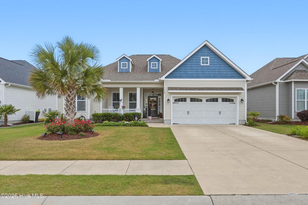 Photo of 7008 Sevilleen Drive SW, Ocean Isle Beach, NC 28469 (MLS # 100572117)