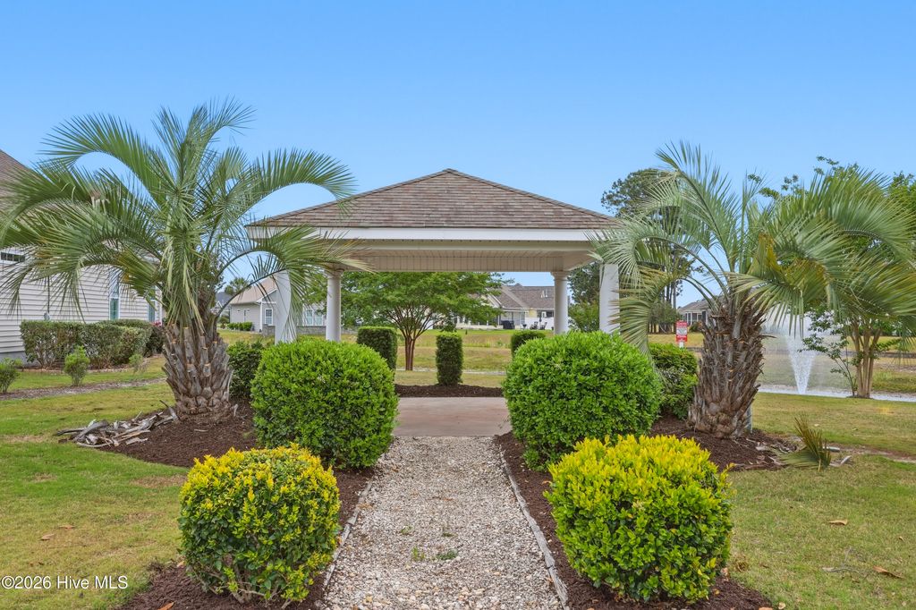 Photo of 7008 Sevilleen Drive SW, Ocean Isle Beach, NC 28469 (MLS # 100572117)