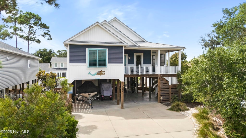 Photo of 127 NE 34th Street, Oak Island, NC 28465 (MLS # 100606717)