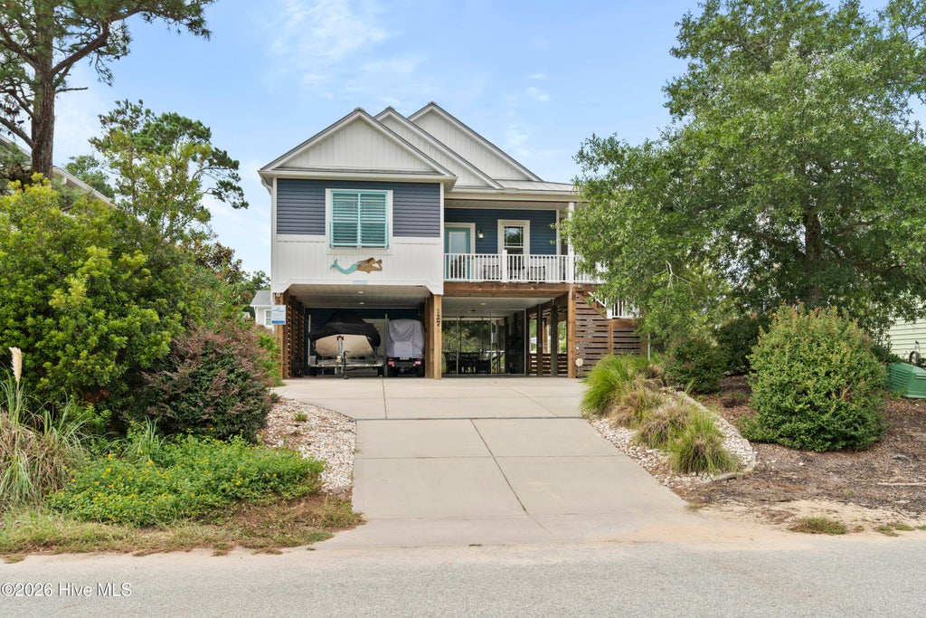 Photo of 127 NE 34th Street, Oak Island, NC 28465 (MLS # 100606717)