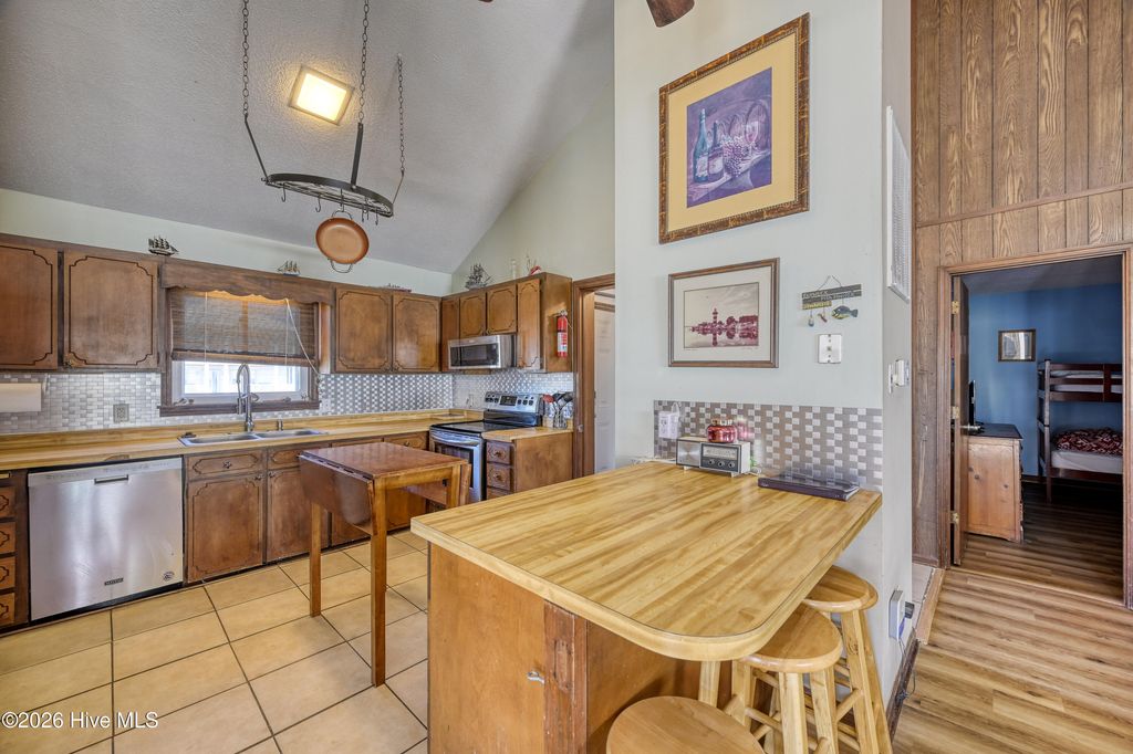 Photo of 1826 S Shore Drive, Surf City, NC 28445 (MLS # 100557799)