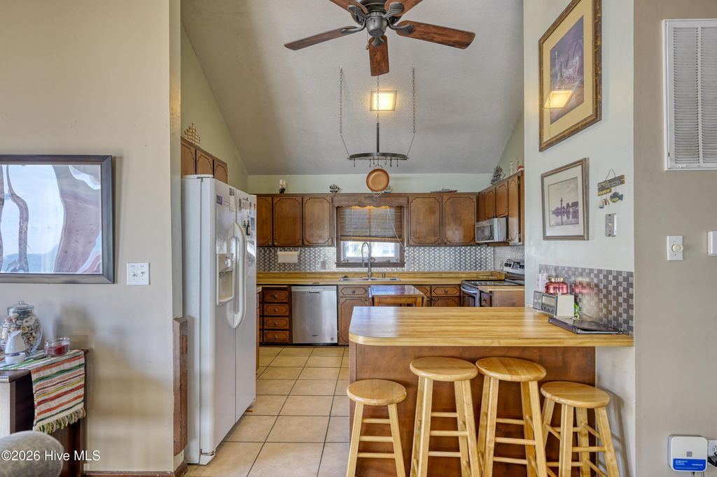 Photo of 1826 S Shore Drive, Surf City, NC 28445 (MLS # 100557799)