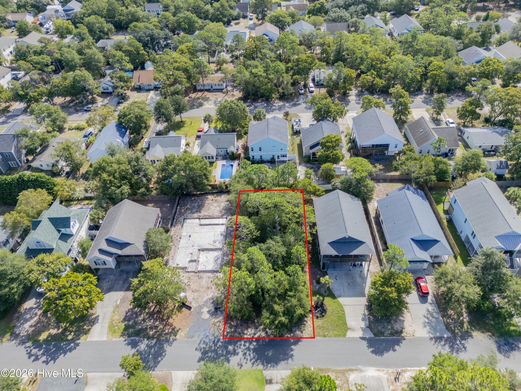 Photo of 136 NE 12th Street, Oak Island, NC 28465 (MLS # 100607000)