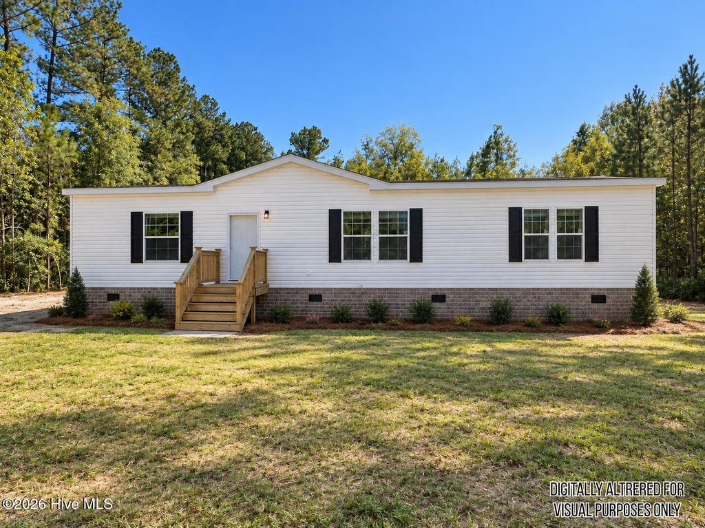 Photo of 388 Mallard Roost Drive, Burgaw, NC 28425 (MLS # 100609048)