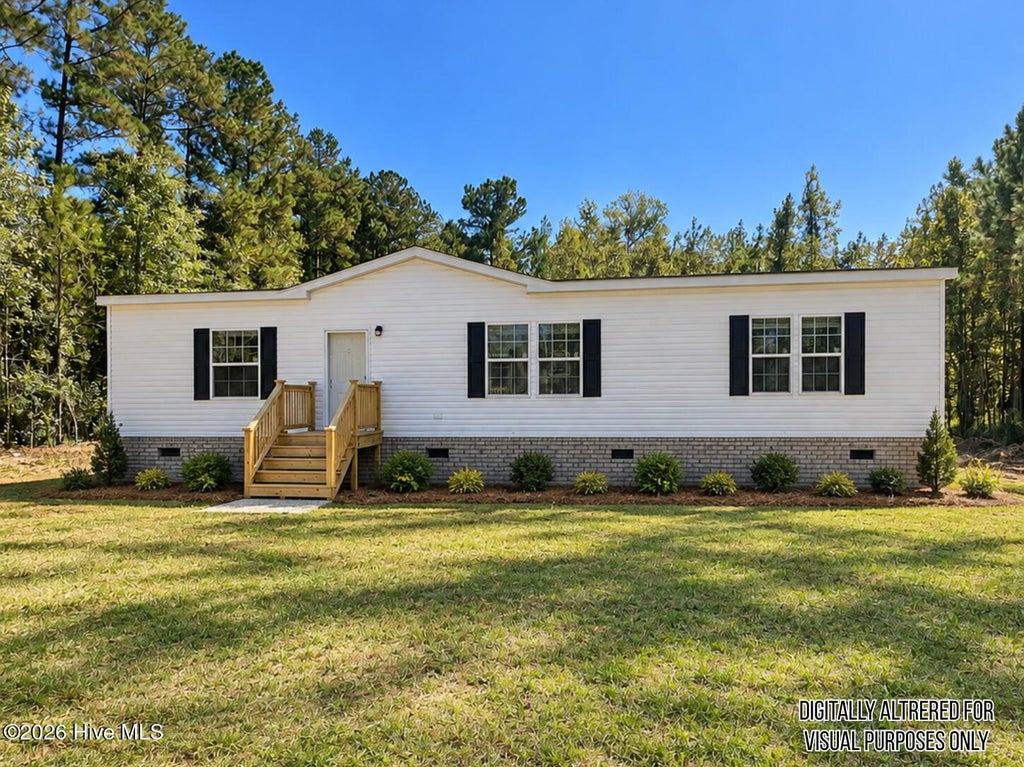 Photo of 388 Mallard Roost Drive, Burgaw, NC 28425 (MLS # 100609048)