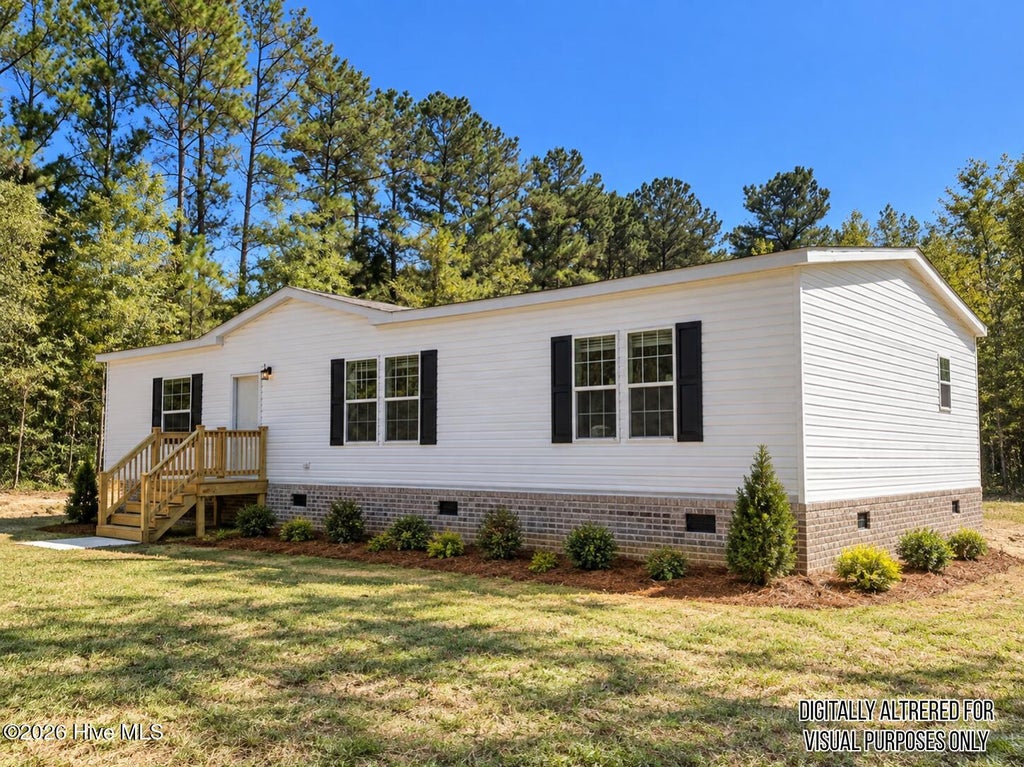 Photo of 388 Mallard Roost Drive, Burgaw, NC 28425 (MLS # 100609048)