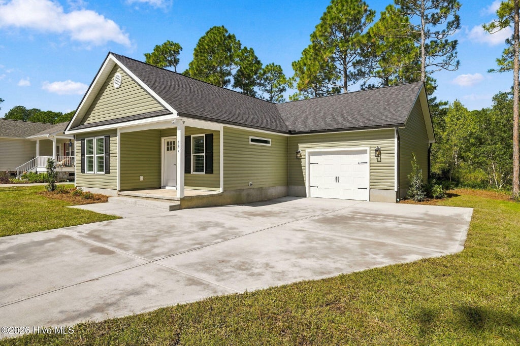 Photo of 587 Greenmoss Road, Southport, NC 28461 (MLS # 100609212)