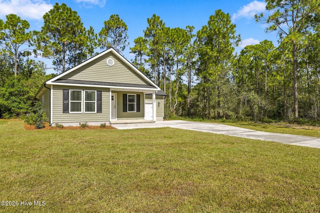 Photo of 587 Greenmoss Road, Southport, NC 28461 (MLS # 100609212)