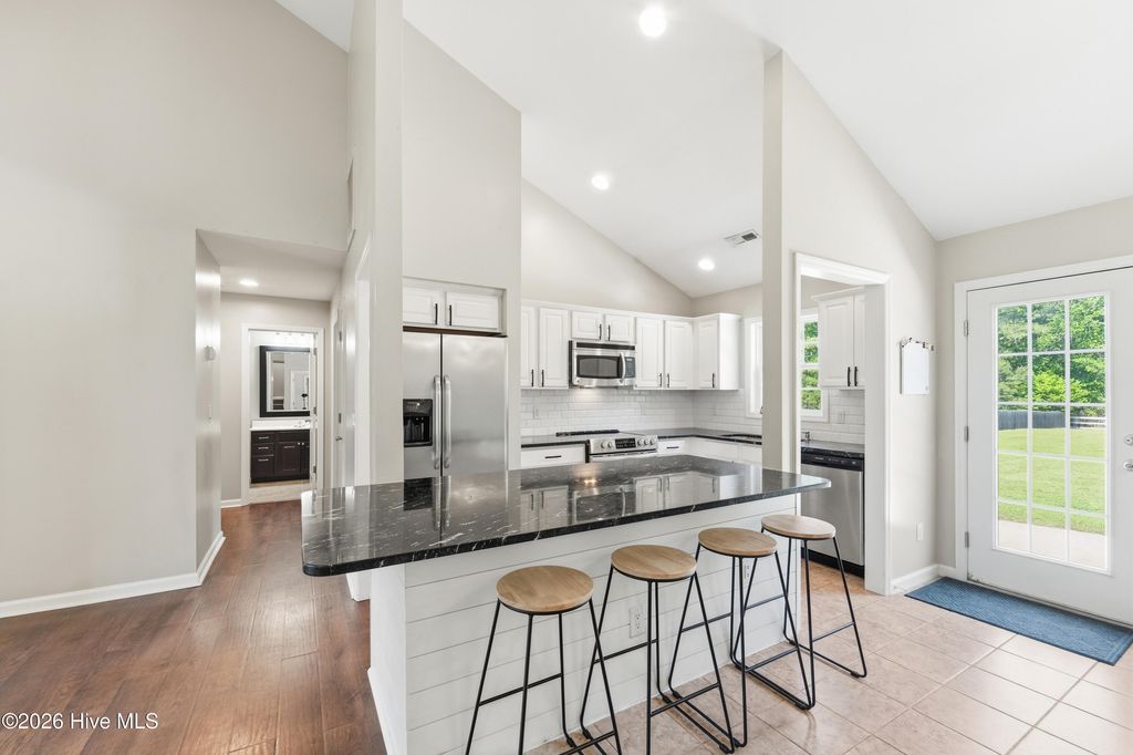 Photo of 225 Blue Creek Farms Drive, Jacksonville, NC 28540 (MLS # 100568170)