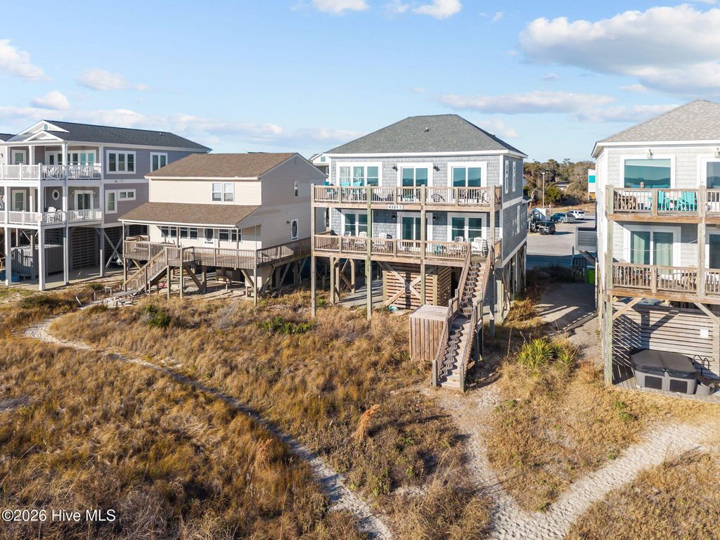 Photo of 4321 E Beach Drive, Oak Island, NC 28465 (MLS # 100547503)