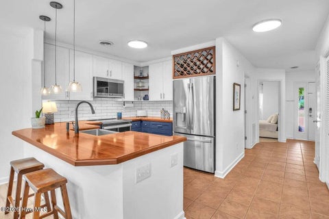Tiny photo for 6211 Wrightsville Avenue #Apt 114, Wilmington, NC 28403 (MLS # 100592130)