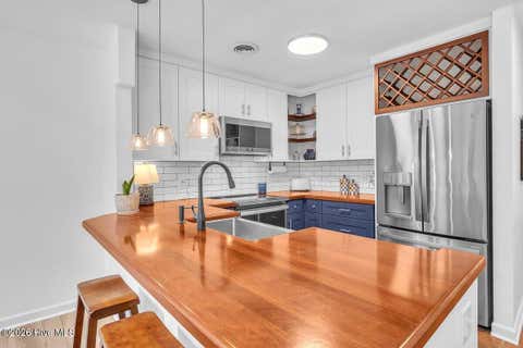 Tiny photo for 6211 Wrightsville Avenue #Apt 114, Wilmington, NC 28403 (MLS # 100592130)