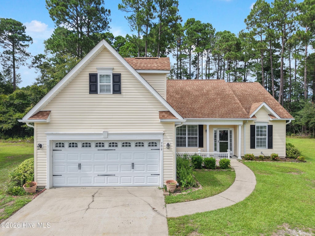 Photo of 709 E Pipers Glen, Shallotte, NC 28470 (MLS # 100600551)