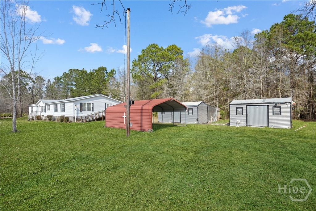 Photo of 60 Tin Cup Lane NE, Ludowici, GA 31316 (MLS # SA349788)