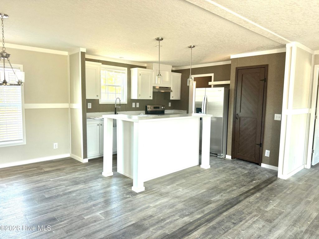 Photo of 6850 Lewis Drive SE, Winnabow, NC 28479 (MLS # 100559153)