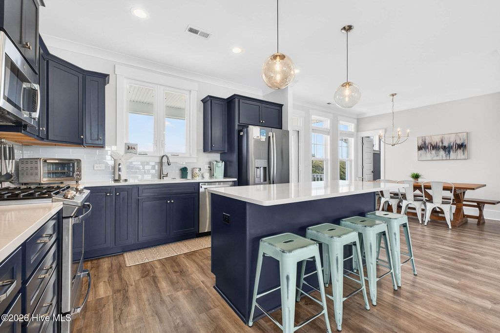 Photo of 4927 E Pelican Drive, Oak Island, NC 28465 (MLS # 100565518)