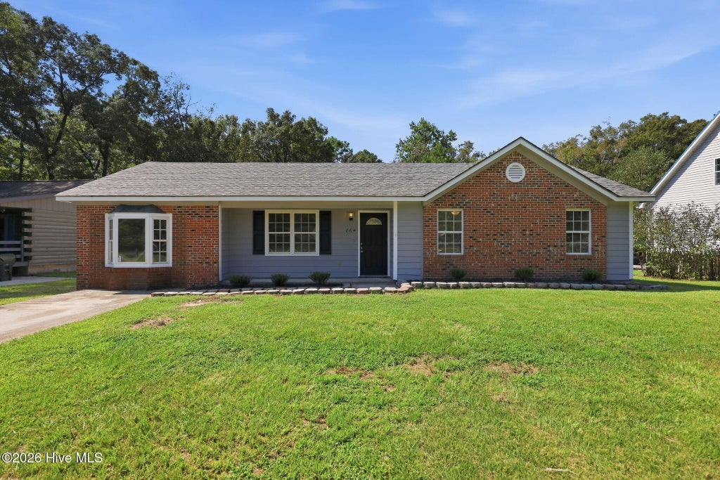 Photo of 864 Mill River Road, Jacksonville, NC 28540 (MLS # 100601439)