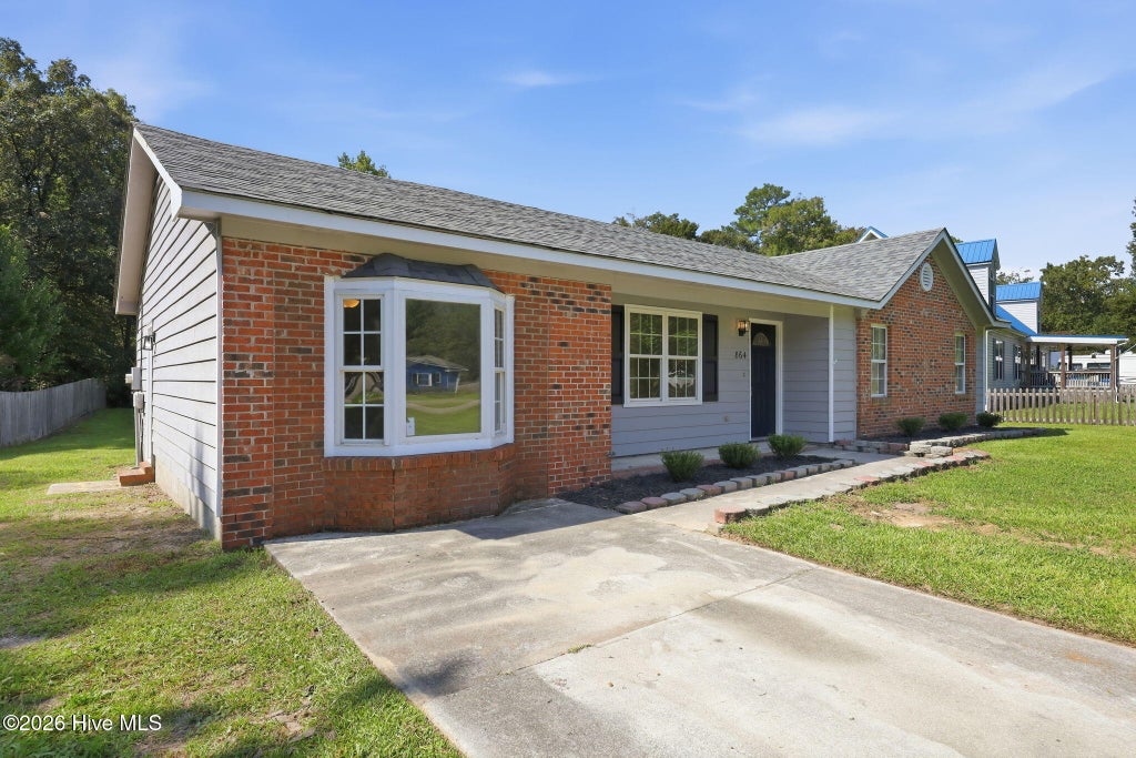 Photo of 864 Mill River Road, Jacksonville, NC 28540 (MLS # 100601439)