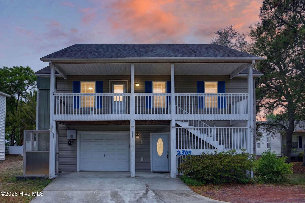 Photo of 2305 E Oak Island Drive, Oak Island, NC 28465 (MLS # 100573150)