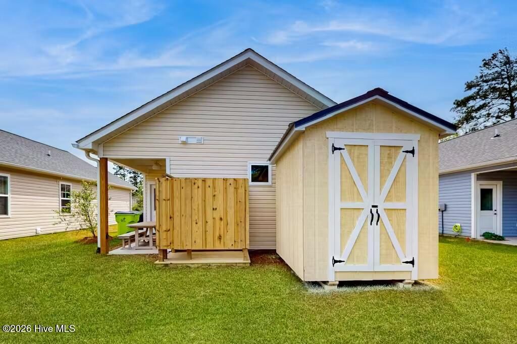 Photo of 121 NE 75th Street, Oak Island, NC 28465 (MLS # 100559345)